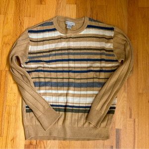 Brown striped sweater from retreat in a size medium.